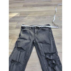 American Eagle black ripped skinny jeans , super super stretch. Size 6.  Good co